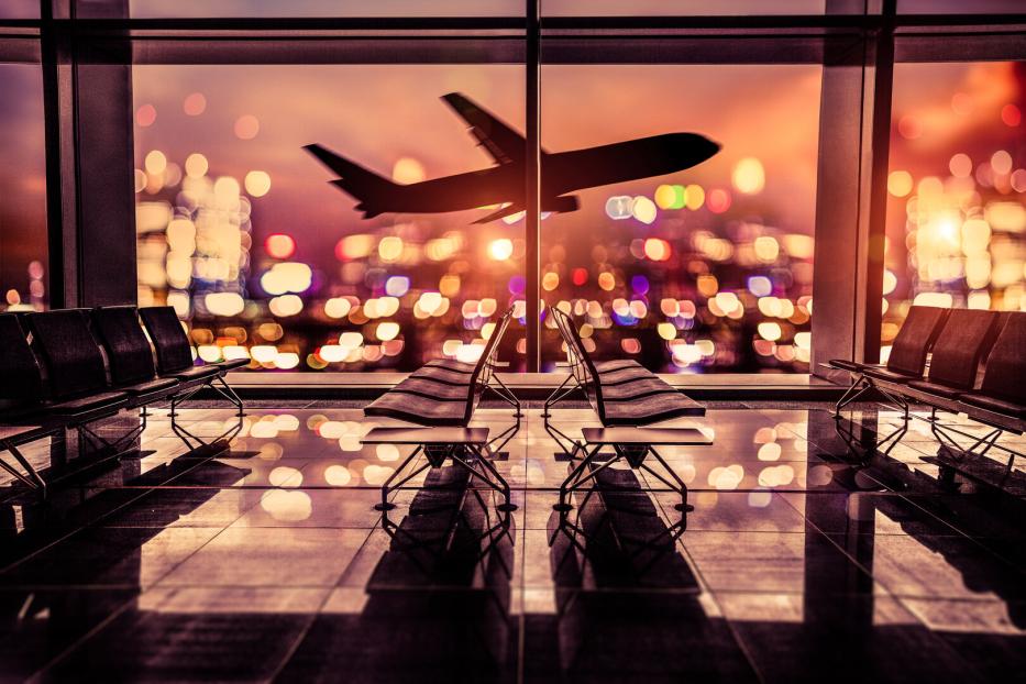 Airport Lounge and airplane take off in the city