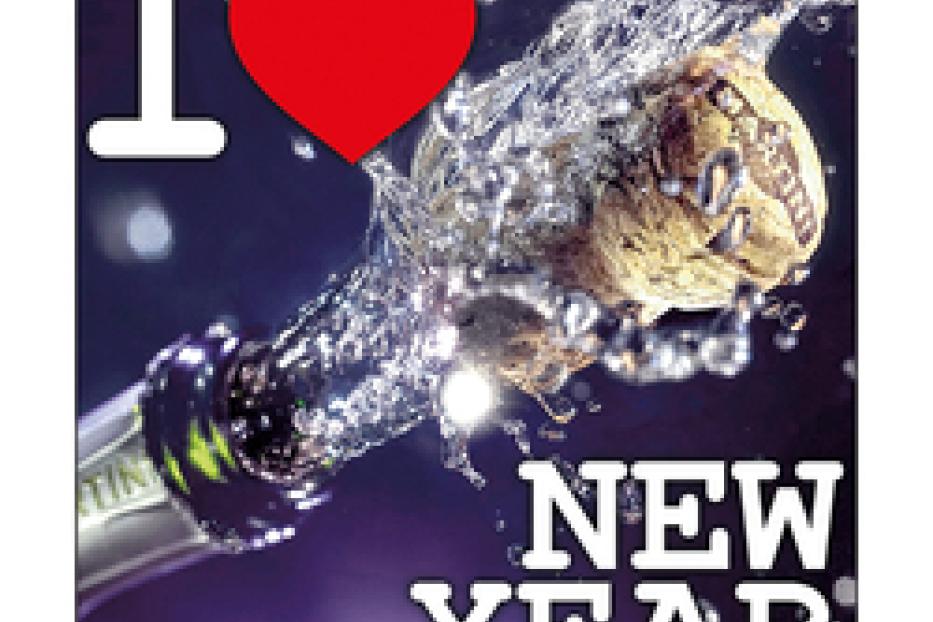 Ein Champagnerkorken spritzt vor dem Hintergrund eines „I Love New Year“-Logos.