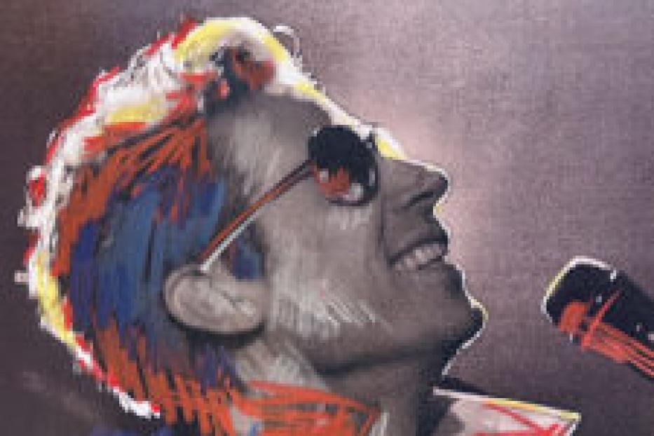 Ein Mann mit Sonnenbrille singt in ein Mikrofon, künstlerisch überzeichnet mit bunten Farben.