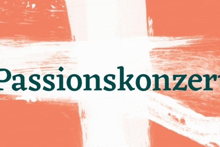 Ein Banner wirbt für ein Passionskonzert.