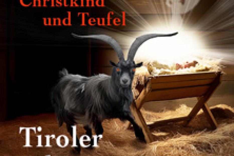 Ein Ziegenbock steht neben einer Krippe, darüber ein Engels-Schemen.