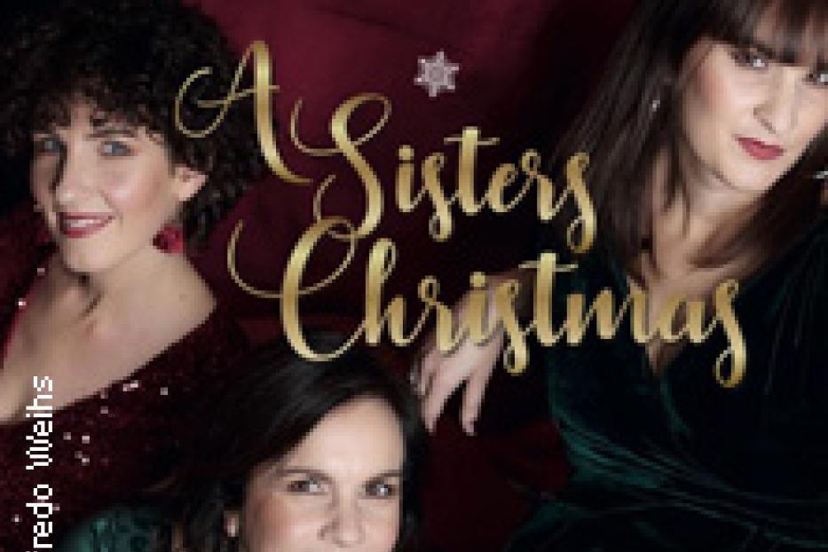 Das Cover des Albums „A Sisters Christmas“ der Schick Sisters zeigt die drei Schwestern in festlicher Kleidung.