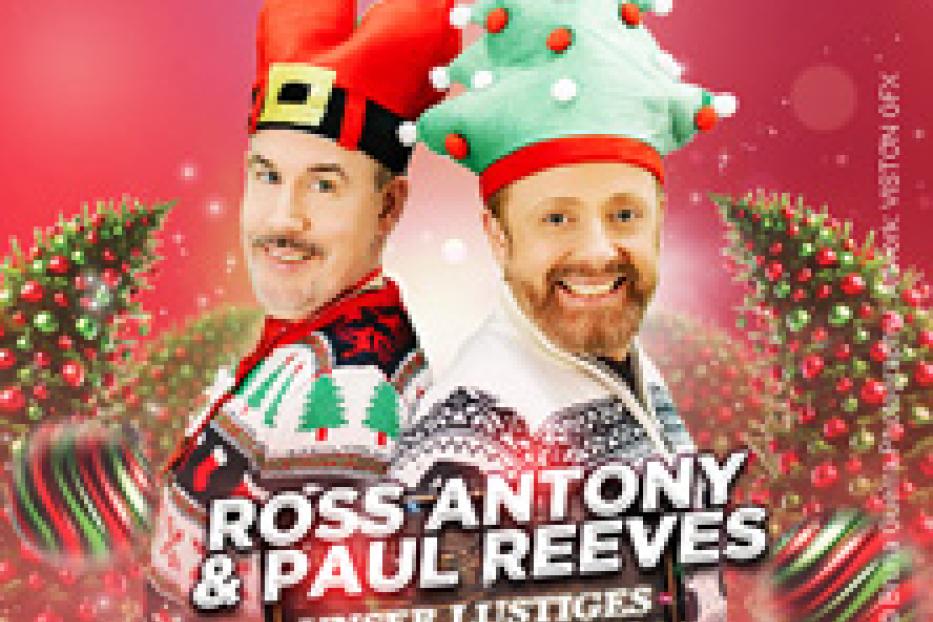 Ross Antony und Paul Reeves mit Weihnachtsmützen werben für „Unser lustiges Weihnachten“.