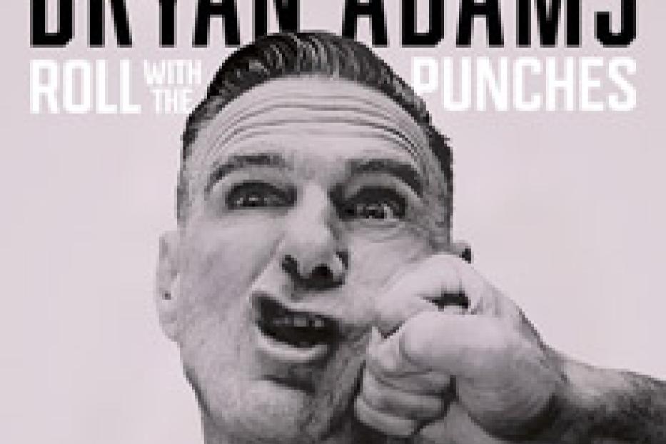 Das Albumcover von Bryan Adams' „Roll with the Punches“ zeigt Adams, der einen Schlag ins Gesicht bekommt.