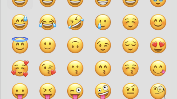 Verschieden gelbe Smileys auf grauem Hintergrund