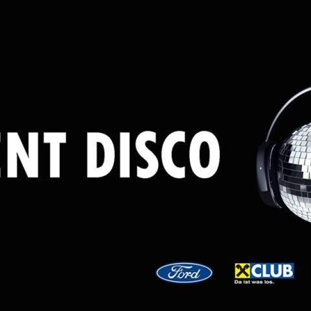 Eine Discokugel mit Kopfhörern und dem Schriftzug „Silent Disco“.