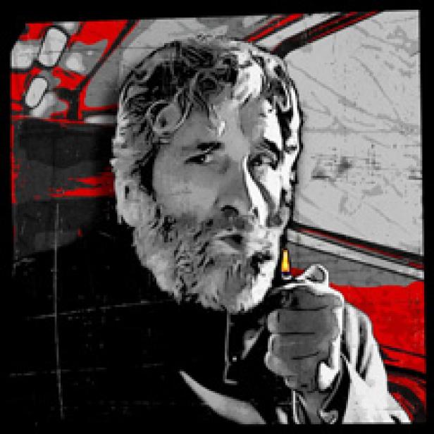 Ein Mann mit Bart zündet sich eine Zigarette an.